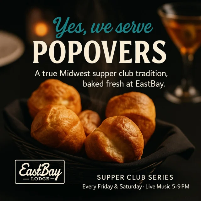 Let’s talk popovers — the quiet royalty of the Midwest supper club world.
They didn’t start in Wisconsin, but they became Wisconsin the moment supper clubs did.
Warm, airy, buttery, impossibly comforting… the kind of bread that doesn’t just sit on the table — it defines the table.

Popovers have always symbolized what supper clubs stand for:
hospitality, tradition, and a little bit of ritual.
You don’t just “get” a popover — you’re welcomed with one.
And that’s exactly why they matter here.

At Eastbay, we’ve taken that tradition and woven it into the heart of our Supper Club Series — a full reinvention of what the lodge experience can be.

✨ Soft seating tucked around the area’s only true craft cocktail bar
✨ Live supper club sounds every Friday and Saturday
✨ A menu that honors the classics and elevates the experience
✨ Popovers — baked fresh, served warm, and always complimentary with supper club entrées

Because we’re more than a dinner reservation…
We’re atmosphere. We’re escape. We’re your Northwoods night done right.

And here’s what this weekend looks like:

FRIDAY — FISH FRY + KIM NEGUS LIVE (5–9 PM)

Dinner served 4–9 PM
• Beer-battered Walleye
• Broiled or beer-battered Cod
Served with potato, slaw, lemon & tartar.
$15
Salad Bar +$4.95
🎤 Live in the Supper Club: Kim Negus, 5–9 PM
The perfect soundtrack to a winter Wisconsin Friday.

SATURDAY — PRIME RIB + NICK & ANNA LIVE (5–9 PM)

Dinner served 4 PM–Close
Carved prime rib with choice of potato, salad bar, house au jus & horsey sauce.
(While supplies last.)
10oz – $29
14oz – $34
🎶 Live in the Supper Club: Nick & Anna, 5–9 PM
Atmosphere, harmonies, cocktails, and popovers — a perfect Saturday night.

Popovers, history, cocktails, music, tradition — all under one roof.
And with the holidays and New Year rush coming fast, the best way to experience it all is simple:

Make a reservation today.
👉 https://www.eastbayholcombe.com/reservations/

Because around here, we don’t just serve supper.
We serve memories.